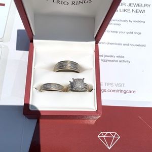 Wedding trio set. About 4 years old. Light weight. Accents ring finger very nice
